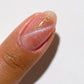 DND DC Gel Polish in Conch Shell #15, vibrant cat eye gel nail polish with shimmering metallic finish.