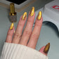 DND DC Gel Polish Ember Enchantress shade, smooth cat eye effect, showcasing vibrant orange-red color on a nail swatch.