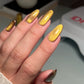 DND DC Gel Polish Ember Enchantress #10 cat eye nail polish swatch showing smooth, vibrant orange with magnetic effect