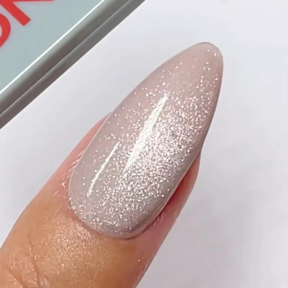 DND DC Gel Polish Fossil Ice #31 swatch showing pink velvet cat eye shimmer nail color.