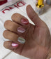 DND DC Gel Polish in Gem Twist #18, a vibrant cat eye gel nail polish with shimmering, multi-dimensional finish.