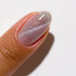 DND DC Gel Polish in Gem Twist #18 featuring a vibrant, shimmering cat eye effect with a gel finish.