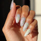 DND DC Gel Polish in Holo Dancer #21 with neon chrome finish, showcasing a vibrant cat eye holographic nail art design.