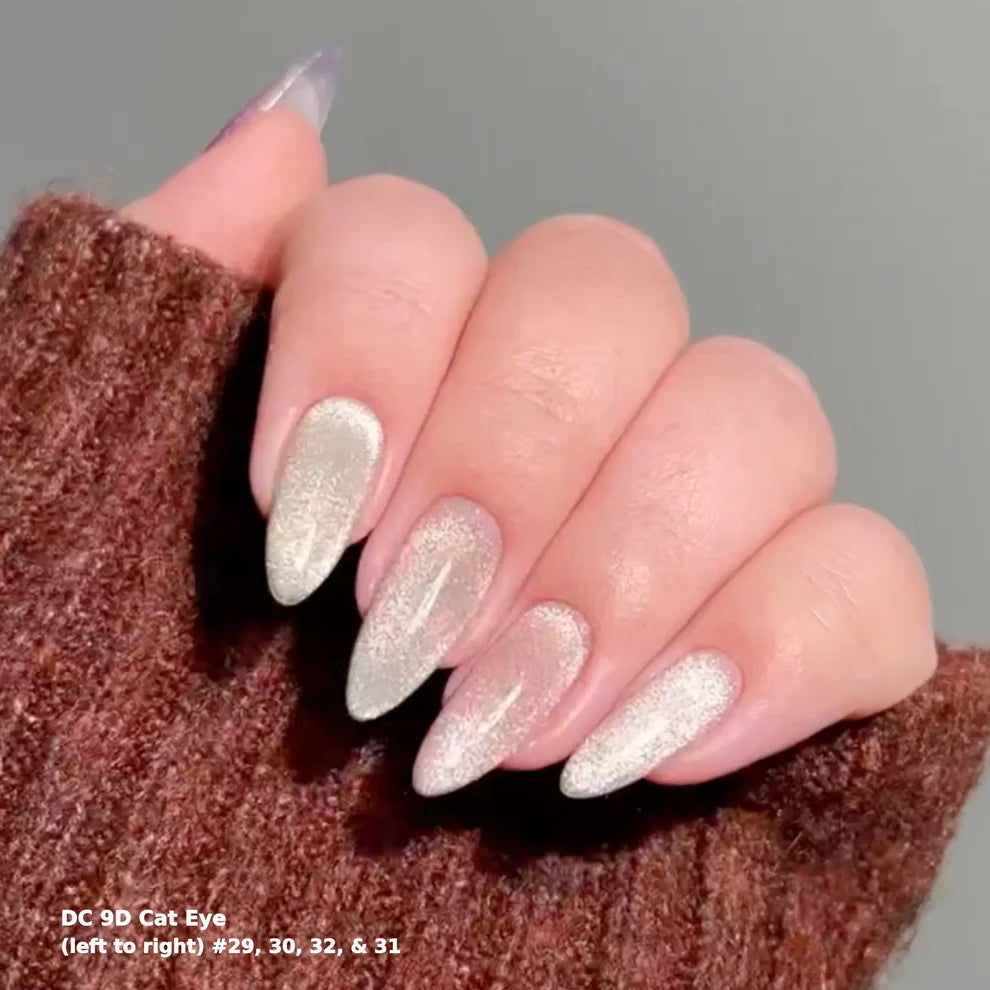 DND DC Gel Polish Cat Eye Korat Stardust shade with velvet shimmer and aura effect, showing swatch on nails.