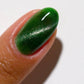 DND DC Gel Polish in Purrsian Purrfection #08, a vibrant cat eye gel nail polish with shimmering purple and pink tones.