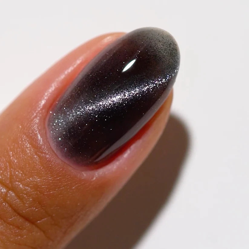 DND DC Gel Polish Shadow Panther #11 with deep black and subtle gray tones, perfect for cat eye nail designs.