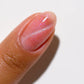 DND DC Gel Polish in Sugar Floss #16, a vibrant pink gel nail color with a glossy finish, displayed in a professional bottle.