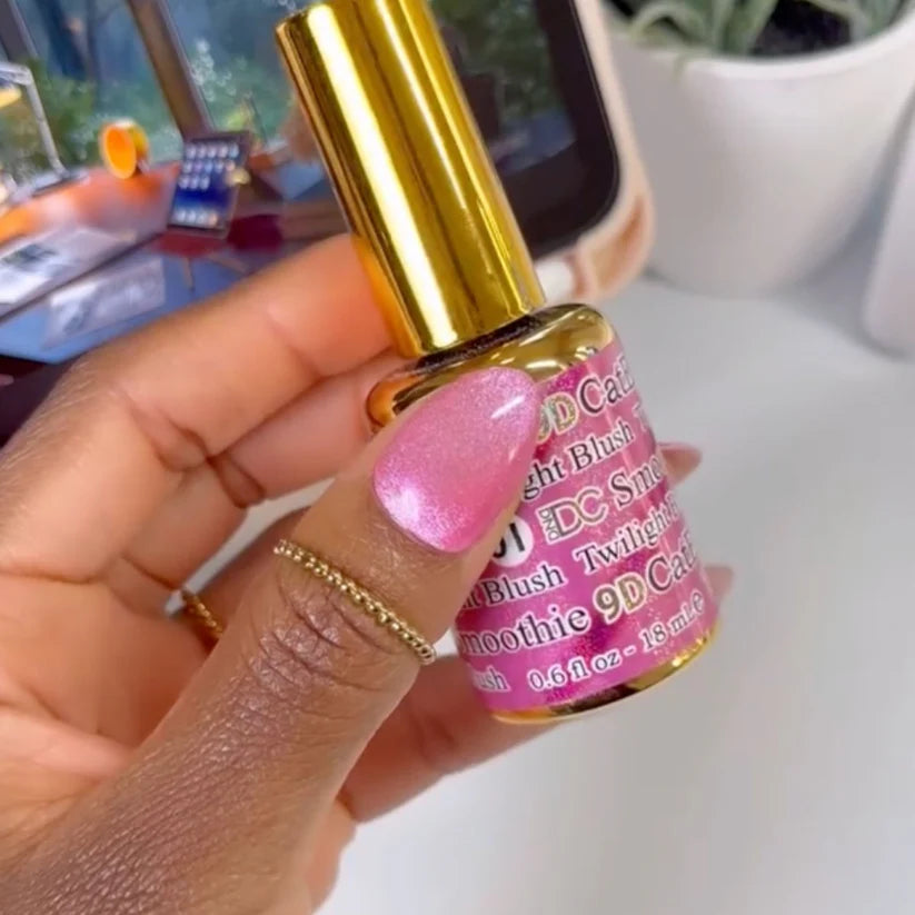 DND DC Gel Polish in Twilight Blush #01, a vibrant cat eye nail gel with shimmering pink and purple hues, swatched on a nail.
