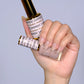 DND DC Gel Duo Barefoot gel nail polish and lacquer set with a glossy nude shade, featuring two bottles on a white background.