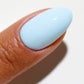 DND DC Gel Duo Barefoot Sea nail polish and lacquer set with a shimmering blue-green gel color, displayed in a bottle.