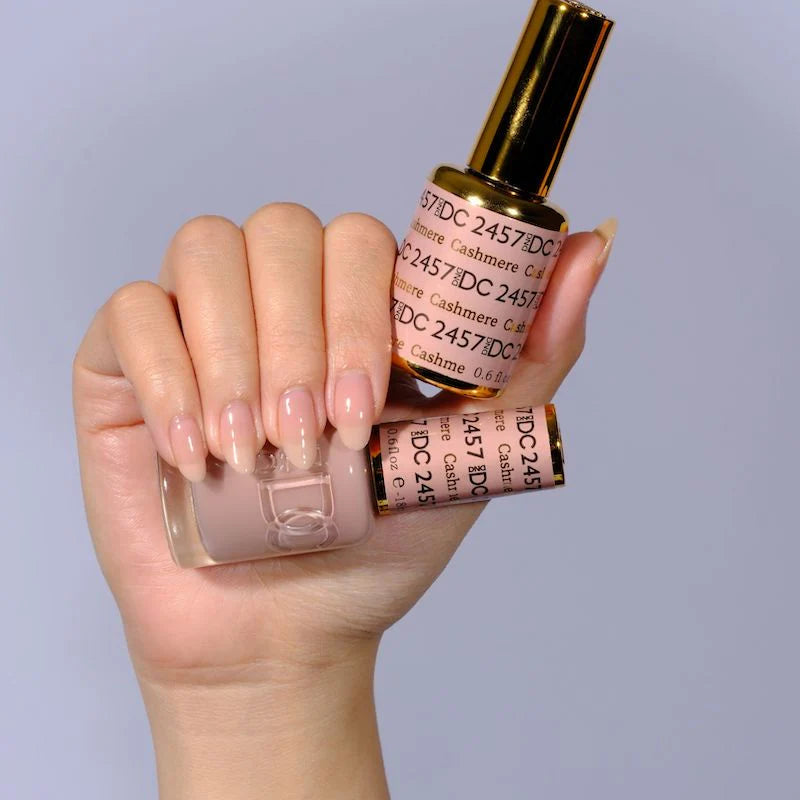 DND DC Gel Duo Cashmere gel nail polish and lacquer set in shade #2457, featuring a smooth, glossy finish on nails.