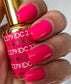 DND DC Gel Duo Coral Bells #279 featuring vibrant coral gel nail polish and lacquer for a professional manicure.