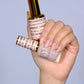DND DC Gel Duo Have Mercy #2448 gel nail polish and lacquer set in a clear bottle with a black cap, showcasing vibrant color.