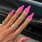 Swatch of DND DC Gel Duo Hibiscus #284 gel nail polish and lacquer showing vibrant pink color on a nail swatch.