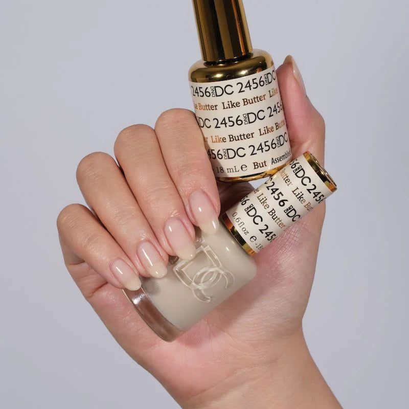 DND DC Gel Duo Like Butter #2456 with gel nail polish and lacquer, showing a smooth, glossy light beige nail polish finish