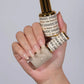 DND DC Gel Duo Like Butter #2456 with gel nail polish and lacquer, showing a smooth, glossy light beige nail polish finish
