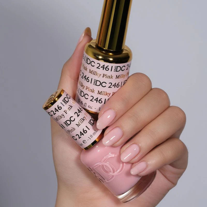 DND DC Gel Duo Milky Pink #2461 gel nail polish and lacquer set with glossy finish, showcasing smooth, applied nails.