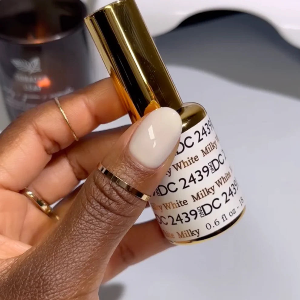 Swatch of DND DC Gel Duo Milky White #2439 gel nail polish and lacquer, showing smooth, opaque white finish.