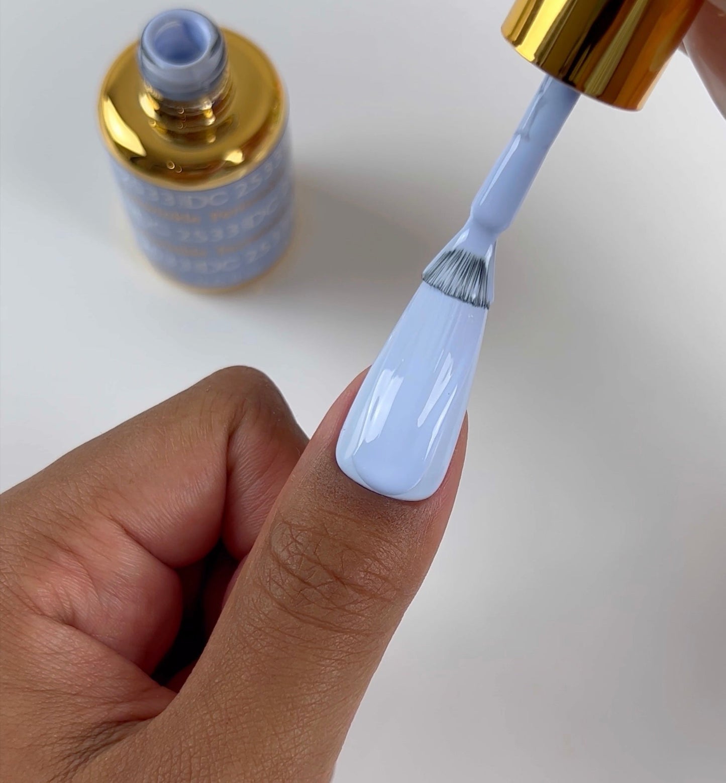 DND DC Gel Duo in Periwinkle #2533 showing a glossy gel nail polish and lacquer with a vibrant periwinkle color.