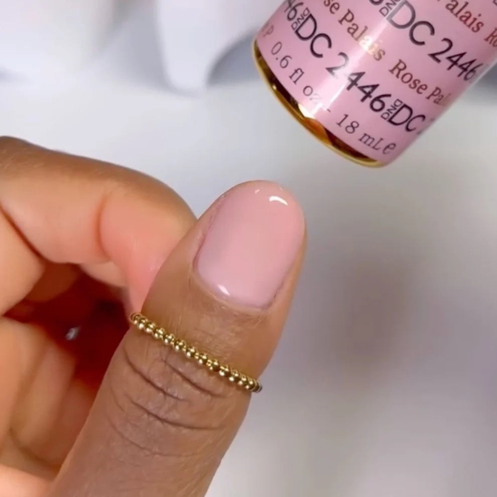 Swatch of DND DC Gel Duo in Rose Palais #2446, showcasing the glossy rose pink gel nail polish and lacquer finish.