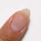 DND DC Gel Duo Sheer Sugar #2443 gel nail polish and lacquer swatch showing glossy, translucent pink finish.