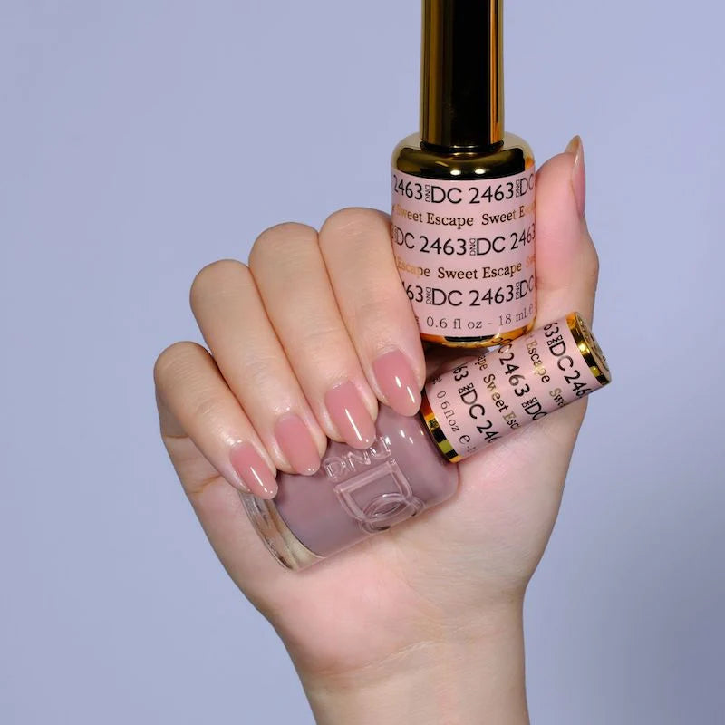 DND DC Gel Duo Sweet Escape #2463 with vibrant gel nail polish and lacquer in a colorful, glossy nail polish set.