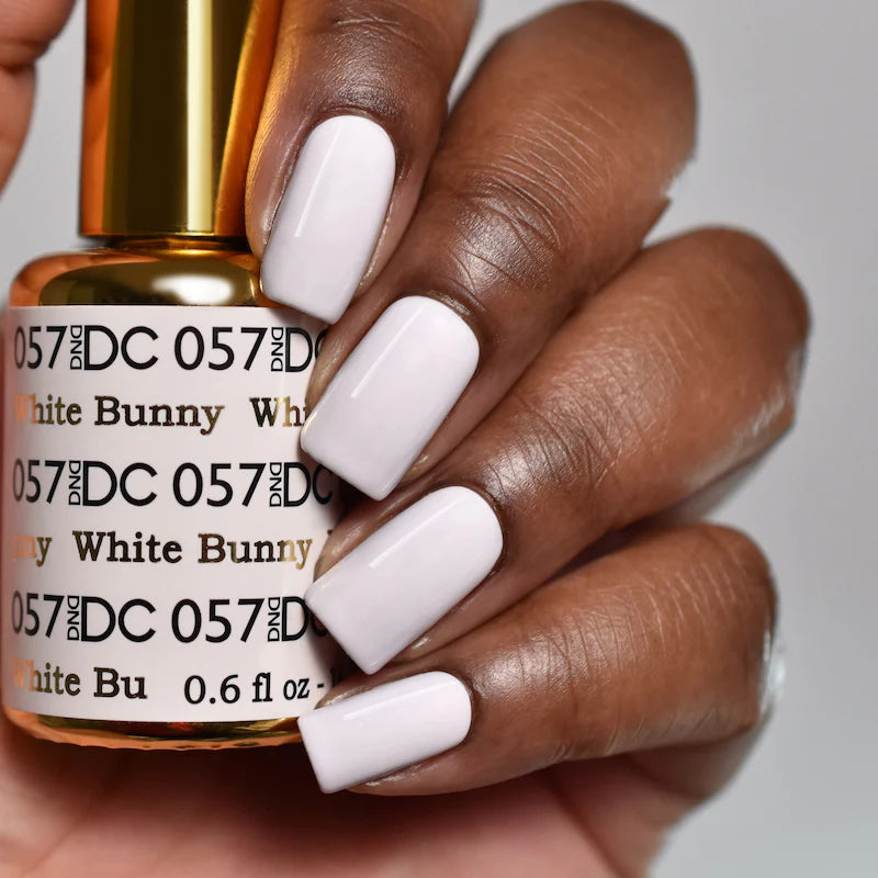 DND DC Gel Duo White Bunny #057 gel nail polish and lacquer set in a clear bottle with white cap, displayed on a neutral background.