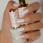 DND DC Gel Duo White Fur #161 gel nail polish and lacquer with a milky, sheer white finish, displayed on a nail sample.