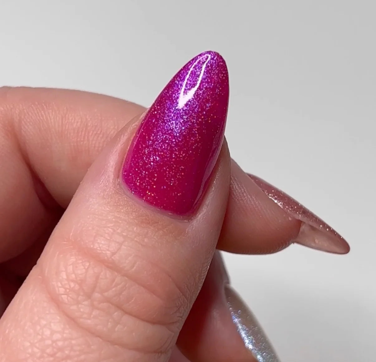 DND DC Gel Nail Polish in Brizo #245, clear gel polish with a smooth, shiny finish, displayed in a professional nail polish bottle