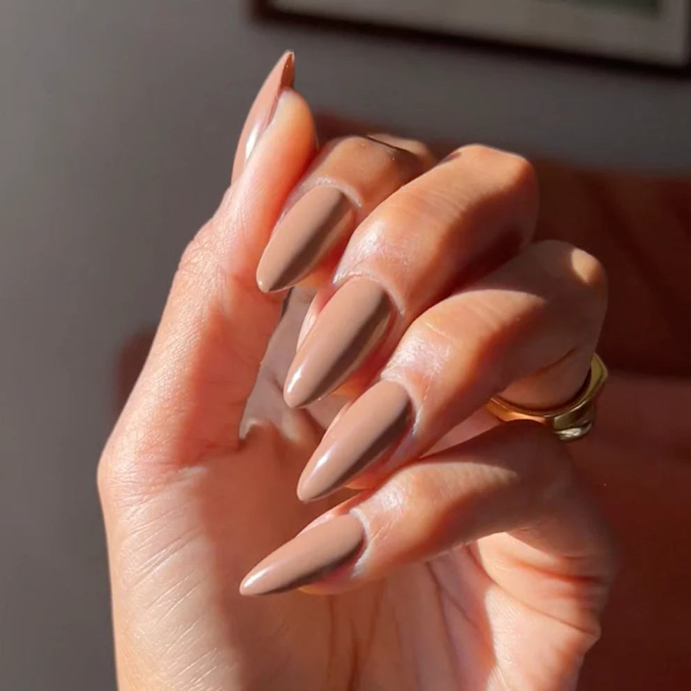 DND Diva Duo Gel and Polish in Almond Toffee, showing a close-up of the gel nail polish and lacquer bottle with almond toffee color