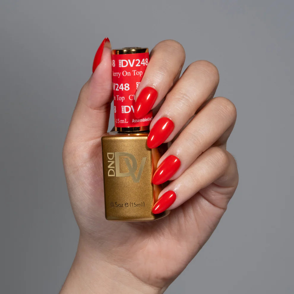 DND Diva Duo Gel & Polish Cherry On Top 248, vibrant red gel nail polish with lacquer finish, in a sleek bottle.