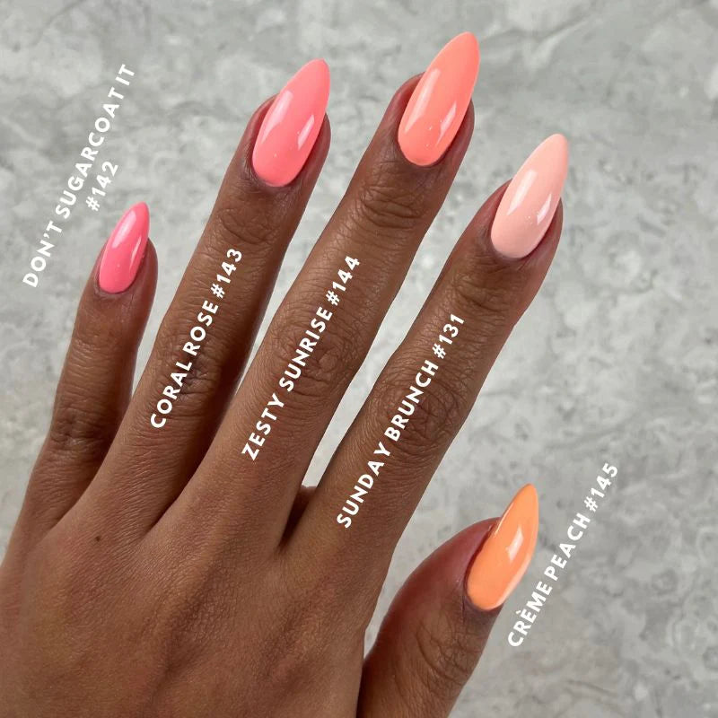 DND Diva Duo Gel & Polish in Coral Rose 143, showing the vibrant coral pink gel nail polish and lacquer bottles.