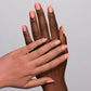 DND Diva Duo Gel & Polish in Coral Rose 143, showing a vibrant coral pink gel nail polish and lacquer bottle.