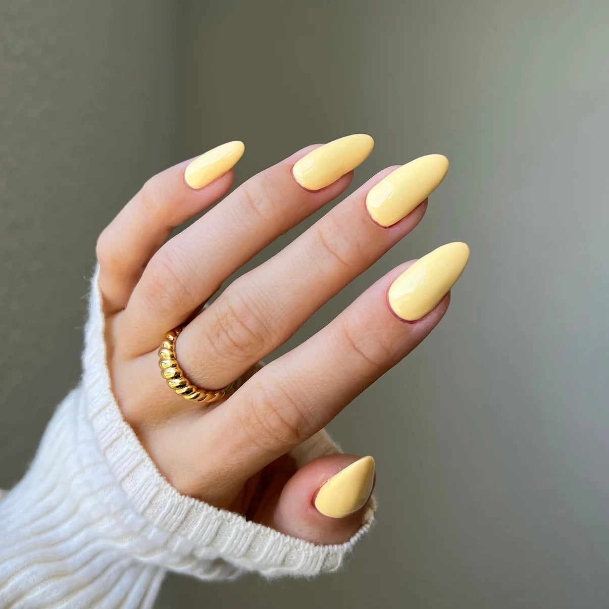 DND Diva Duo Gel & Polish in Dandelion 084 swatch showing bright yellow gel nail polish and lacquer finish.