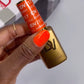 DND Diva Duo Gel & Polish in Fire Breather 217, swatch showing vibrant red-orange gel nail polish and lacquer finish.