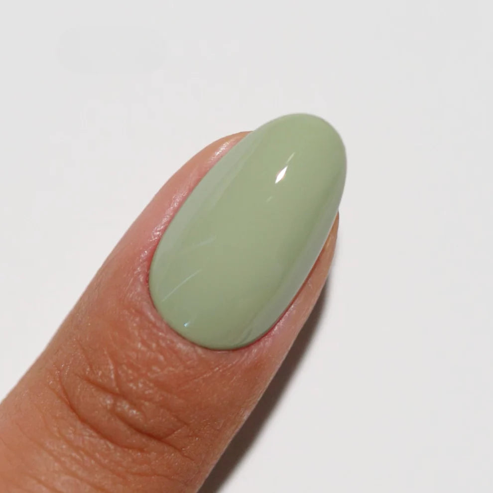 DND Diva Duo Gel & Polish in Foggy Fern 277 showing a close-up of the gel nail polish and lacquer in a muted green shade.