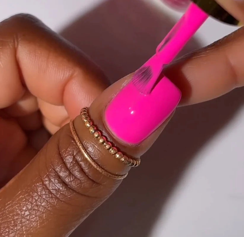 DND Diva Duo Gel & Polish in Fuchsia Rose 215, showing vibrant pink gel nail polish and matching lacquer bottle.