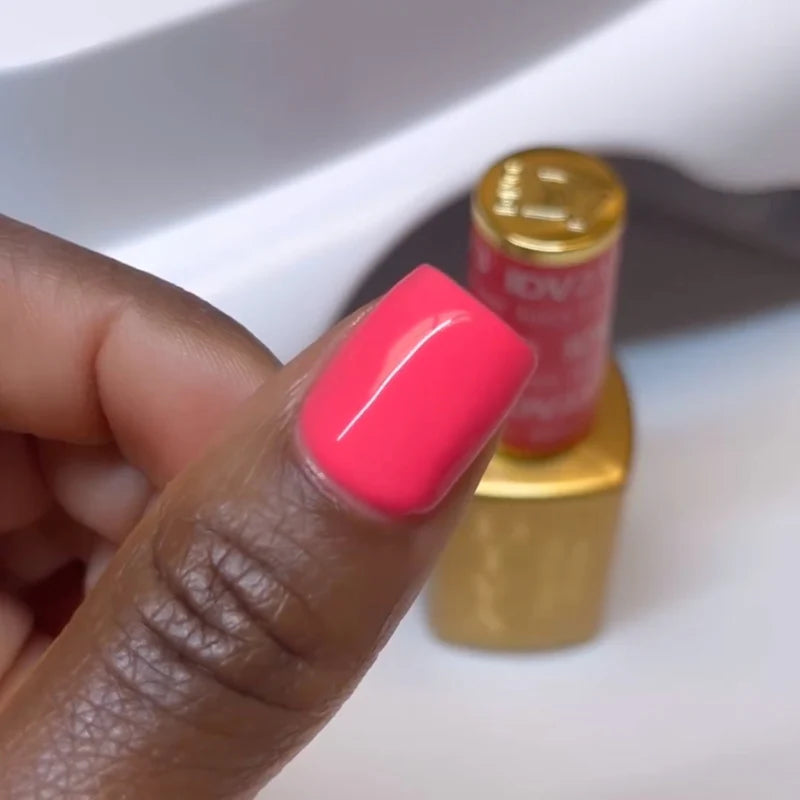 DND Diva Duo Gel & Polish Juicy Fruit 213, vibrant pink gel nail polish and lacquer bottle with colorful label.