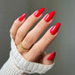 DND Diva Duo Gel & Polish in Left Him On Red 163, vibrant red gel nail polish with lacquer finish, shown on nails.