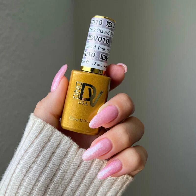 DND Diva Duo Gel & Polish in Pink Glazed 010, showing a shiny pink gel and lacquer nail polish bottle.