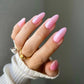 DND Diva Duo Gel and Polish in Pink Glazed 010, showing a close-up of the glossy pink gel nail polish and lacquer finish.
