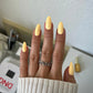 DND Diva Duo Gel & Polish Plz Durian 086 swatch showing vibrant durian yellow gel nail polish and lacquer on nails