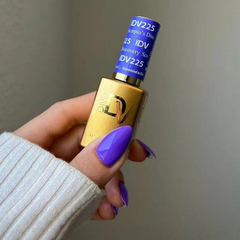 DND Diva Duo Gel & Polish in Scorpio's Discovery 225, showcasing vibrant gel nail polish and lacquer finish on nails.