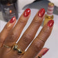 Swatch of DND Diva Duo Gel and Polish Sequin Lipstick 034 showcasing shiny, glittery gel nail polish and lacquer finish.