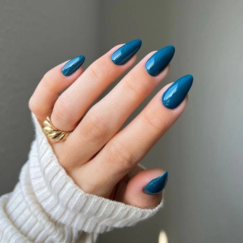 DND Diva Duo Gel & Polish in Teal Treasures 245, showcasing vibrant teal gel nail polish and matching lacquer in a close-up shot.