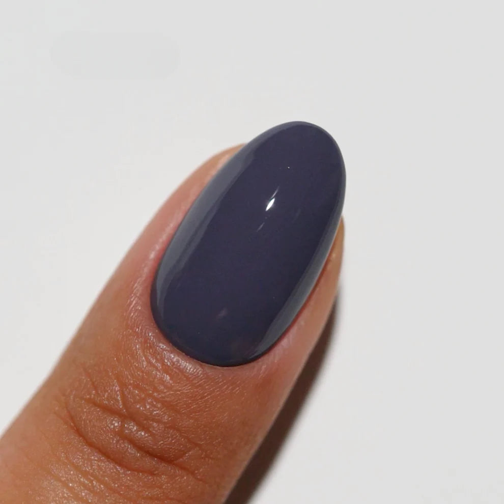 DND Diva Duo Gel & Polish Trip To NYC 263 nail polish and gel set with vibrant blue and glitter finish on nails.