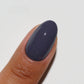 DND Diva Duo Gel & Polish Trip To NYC 263 nail polish and gel set with vibrant blue and glitter finish on nails.