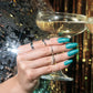 DND Diva Gel High Note 318 clear gel nail polish swatch showing vibrant, glossy finish on natural nails
