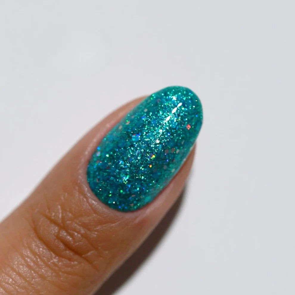 DND Diva Gel High Note 318 clear gel nail polish swatch showing vibrant, shiny blue color on a nail.