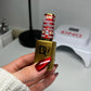 DND Diva 9D Cat Eye Gel Polish in Feisty Paws, showcasing a vibrant glassball finish with magnetic cat eye effect.